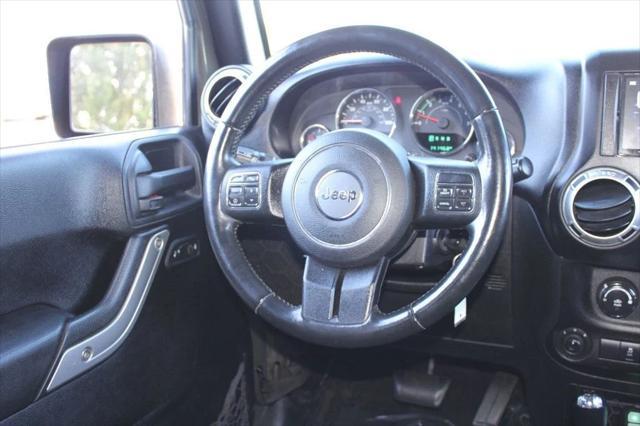 used 2015 Jeep Wrangler Unlimited car, priced at $16,495