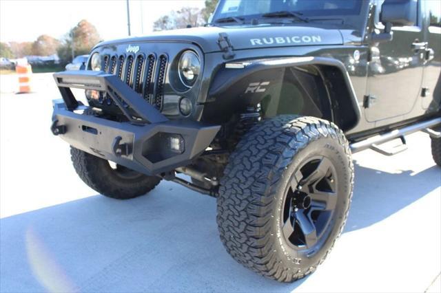 used 2015 Jeep Wrangler Unlimited car, priced at $16,995