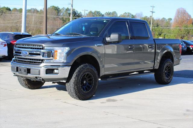 used 2018 Ford F-150 car, priced at $24,295