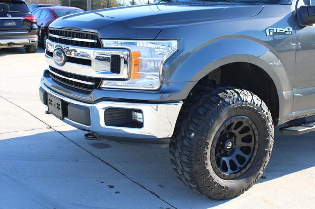 used 2018 Ford F-150 car, priced at $24,295