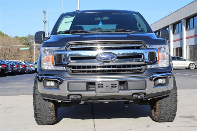 used 2018 Ford F-150 car, priced at $24,295