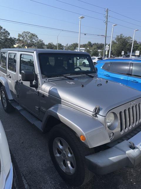 used 2014 Jeep Wrangler Unlimited car, priced at $15,754