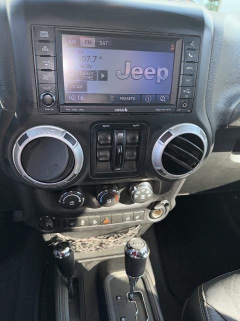 used 2014 Jeep Wrangler Unlimited car, priced at $15,754