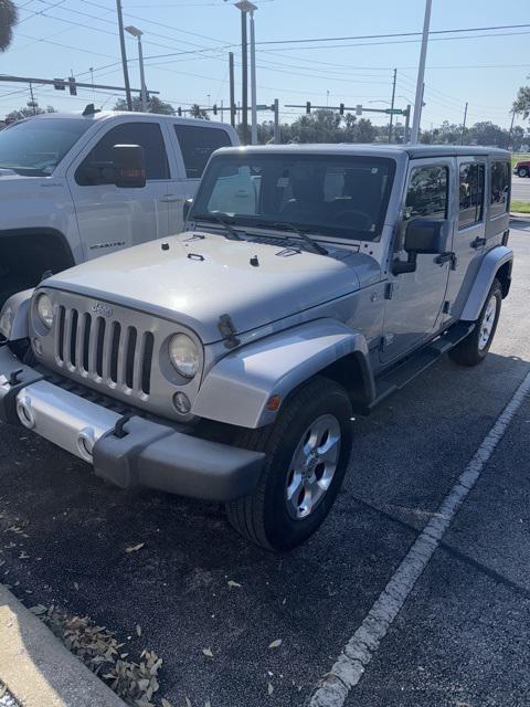 used 2014 Jeep Wrangler Unlimited car, priced at $15,754