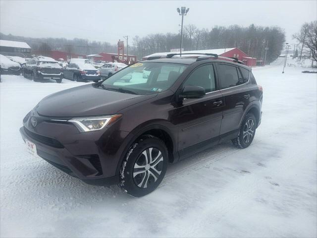 used 2018 Toyota RAV4 car, priced at $20,050