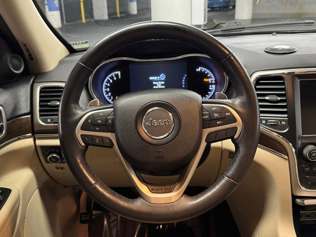 used 2015 Jeep Grand Cherokee car, priced at $14,000