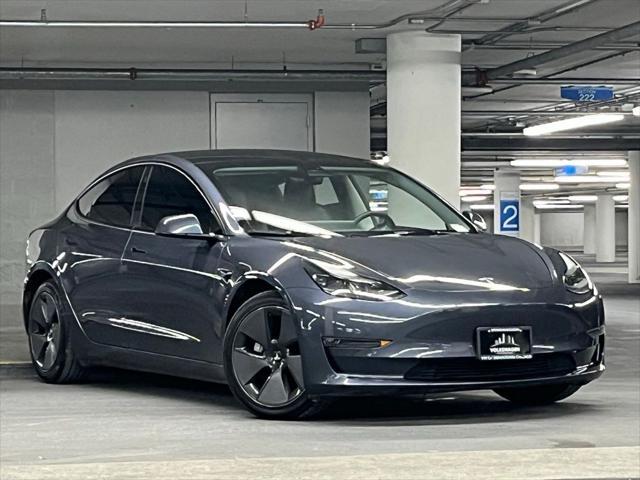 used 2023 Tesla Model 3 car, priced at $22,500