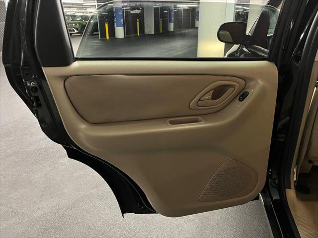 used 2003 Mazda Tribute car, priced at $5,000