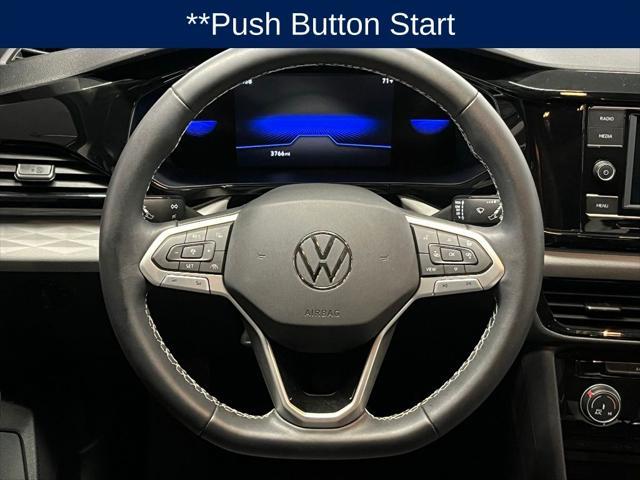 used 2023 Volkswagen Taos car, priced at $22,500