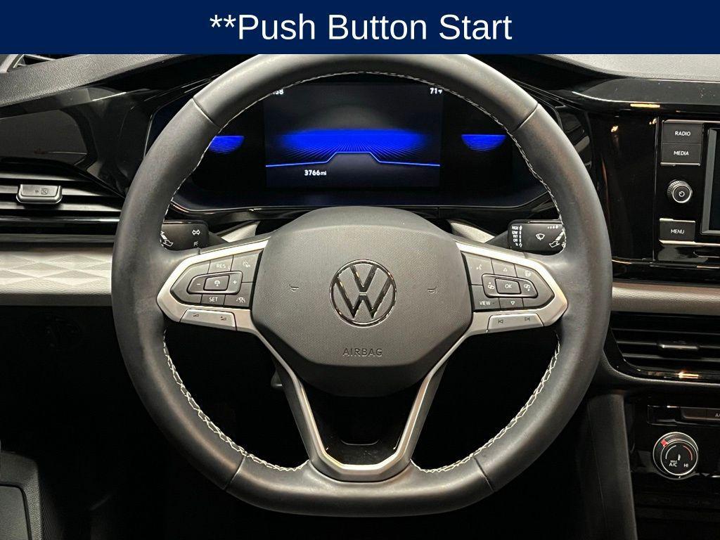 used 2023 Volkswagen Taos car, priced at $21,500