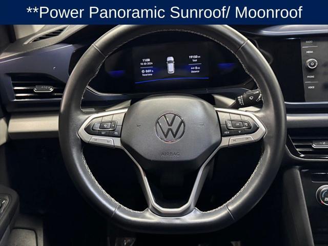 used 2022 Volkswagen Taos car, priced at $19,499