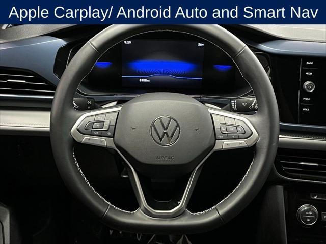 used 2024 Volkswagen Taos car, priced at $24,000