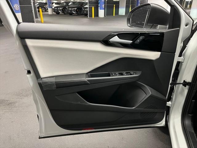 new 2025 Volkswagen Taos car, priced at $26,561