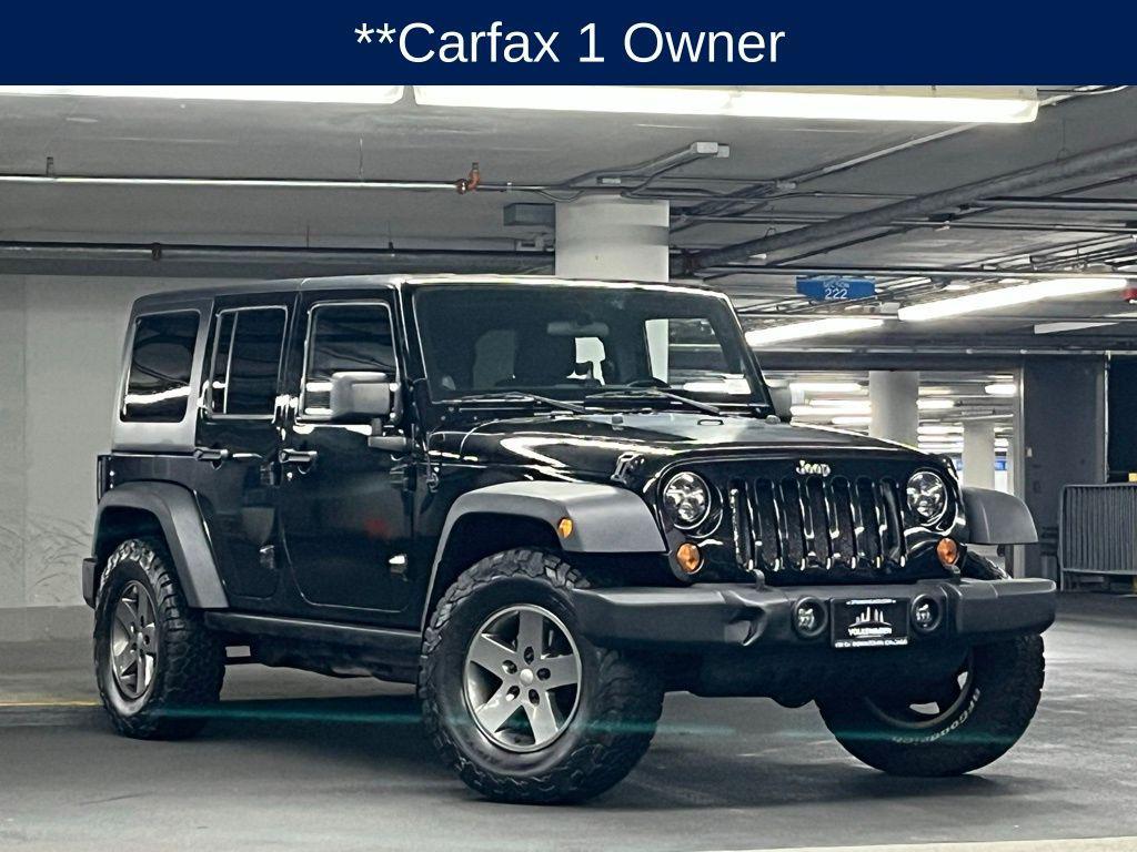 used 2011 Jeep Wrangler Unlimited car, priced at $15,000