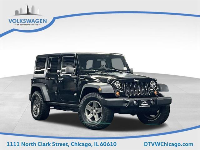 used 2011 Jeep Wrangler Unlimited car, priced at $15,000