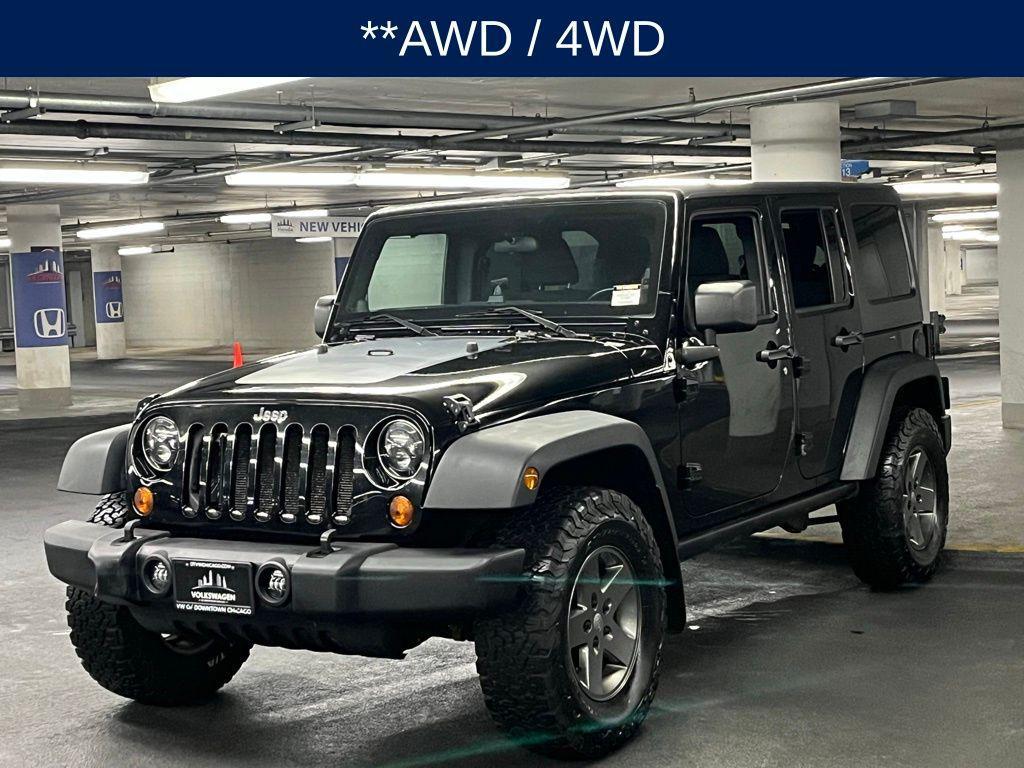 used 2011 Jeep Wrangler Unlimited car, priced at $15,000