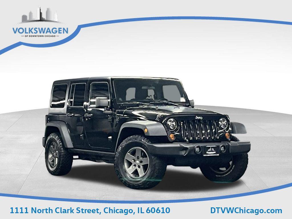 used 2011 Jeep Wrangler Unlimited car, priced at $15,000