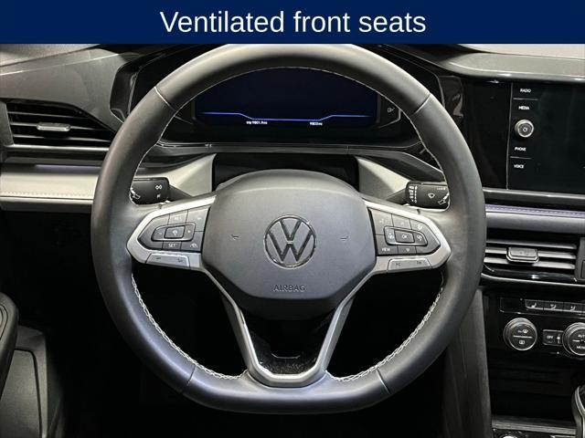used 2023 Volkswagen Taos car, priced at $26,500