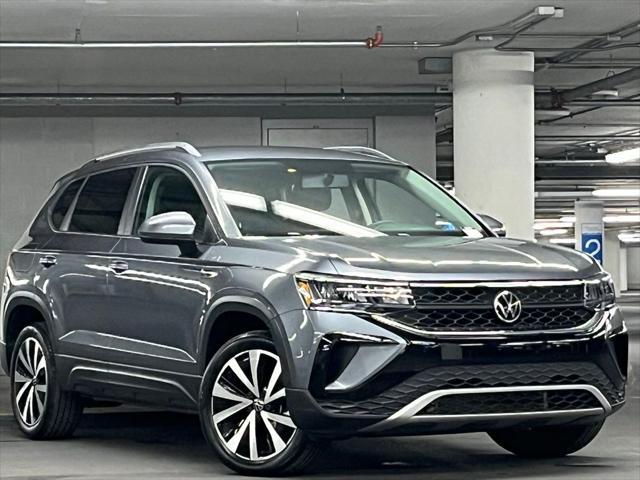 used 2022 Volkswagen Taos car, priced at $21,500