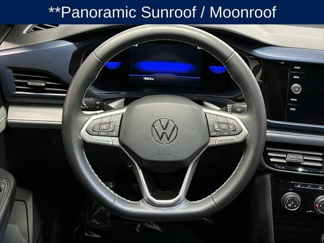 used 2023 Volkswagen Taos car, priced at $24,000