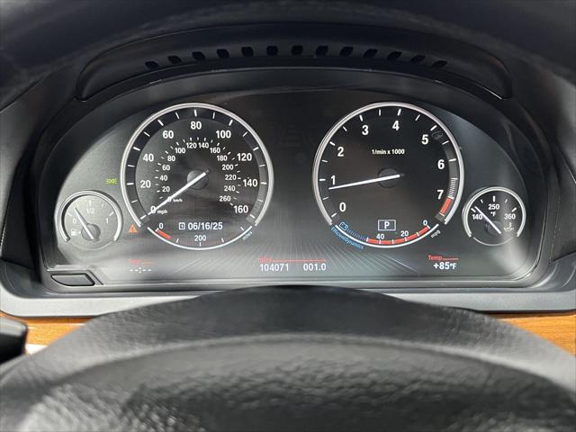 used 2013 BMW 750 car, priced at $11,742