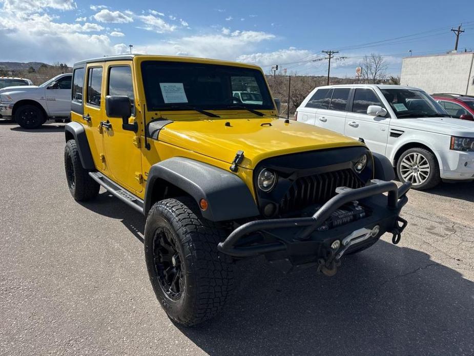 used 2011 Jeep Wrangler Unlimited car, priced at $15,995