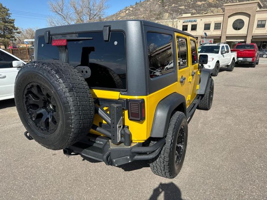 used 2011 Jeep Wrangler Unlimited car, priced at $15,995
