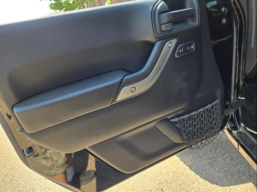used 2015 Jeep Wrangler Unlimited car, priced at $18,995