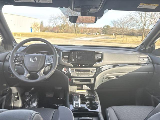 used 2023 Honda Passport car, priced at $34,299