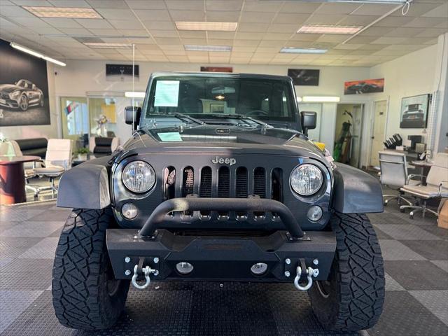 used 2016 Jeep Wrangler Unlimited car, priced at $26,899