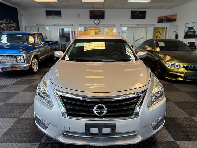 used 2015 Nissan Altima car, priced at $10,950