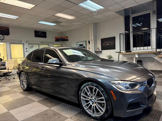 used 2014 BMW 335 car, priced at $17,990