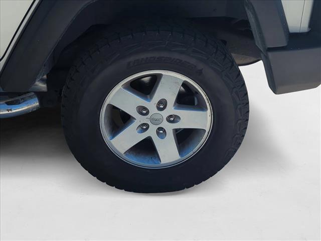 used 2012 Jeep Wrangler Unlimited car, priced at $10,749