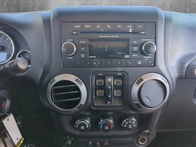used 2012 Jeep Wrangler Unlimited car, priced at $11,999