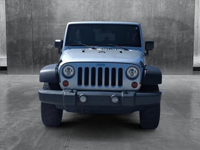 used 2012 Jeep Wrangler Unlimited car, priced at $15,491