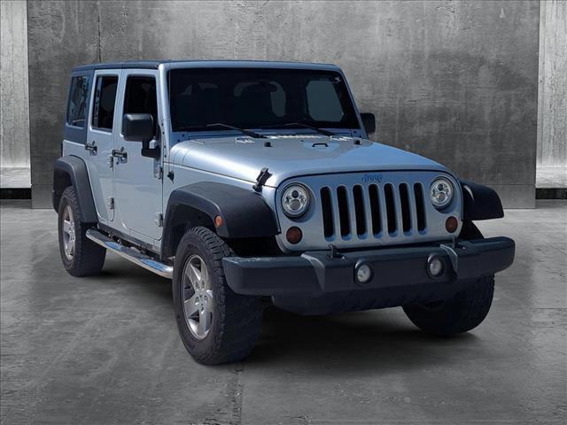 used 2012 Jeep Wrangler Unlimited car, priced at $15,491