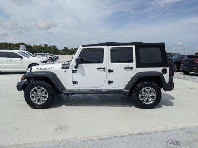 used 2016 Jeep Wrangler Unlimited car, priced at $26,258