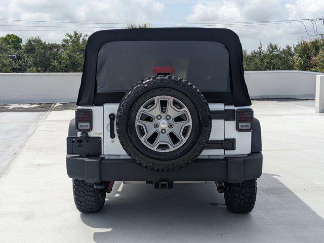 used 2016 Jeep Wrangler Unlimited car, priced at $26,258