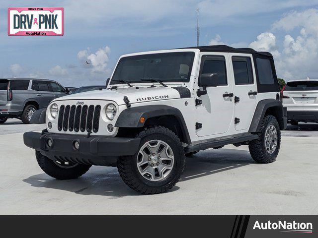 used 2016 Jeep Wrangler Unlimited car, priced at $26,258