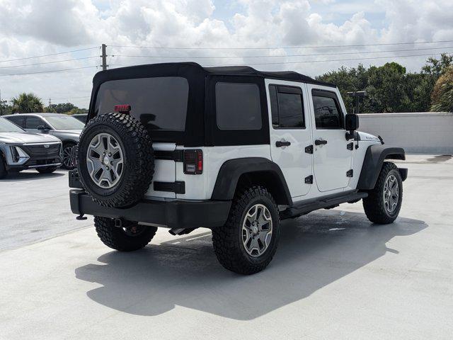 used 2016 Jeep Wrangler Unlimited car, priced at $26,258