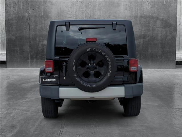 used 2015 Jeep Wrangler Unlimited car, priced at $19,495