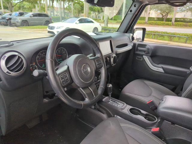 used 2015 Jeep Wrangler Unlimited car, priced at $19,991