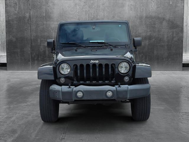 used 2015 Jeep Wrangler Unlimited car, priced at $19,495