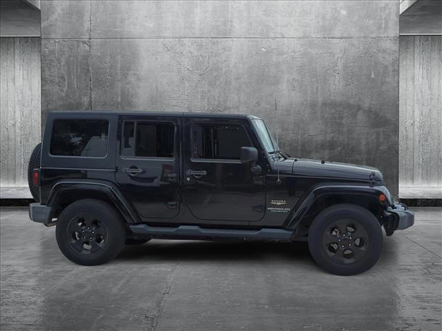 used 2015 Jeep Wrangler Unlimited car, priced at $19,495