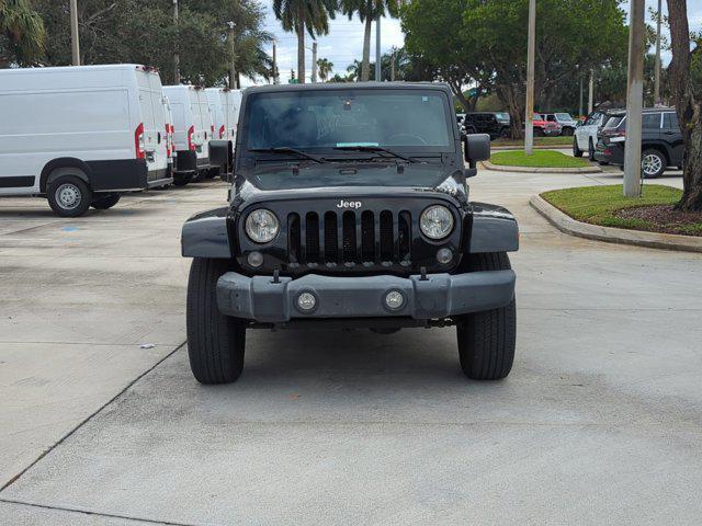 used 2015 Jeep Wrangler Unlimited car, priced at $19,991