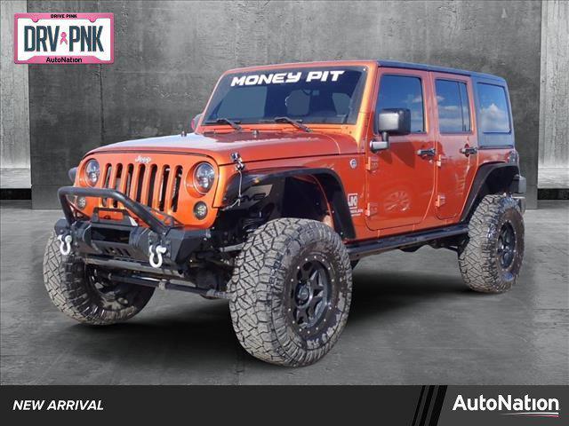 used 2011 Jeep Wrangler Unlimited car, priced at $16,599