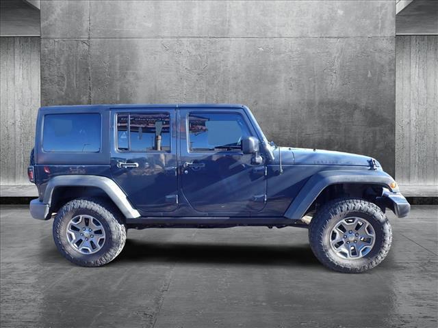 used 2016 Jeep Wrangler Unlimited car, priced at $24,023