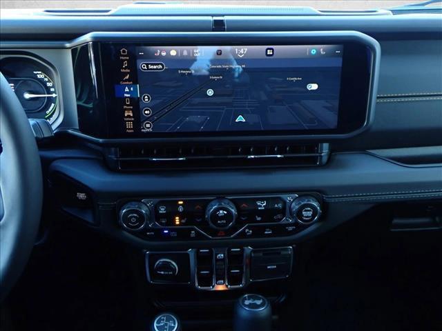 used 2025 Jeep Wrangler 4xe car, priced at $49,597