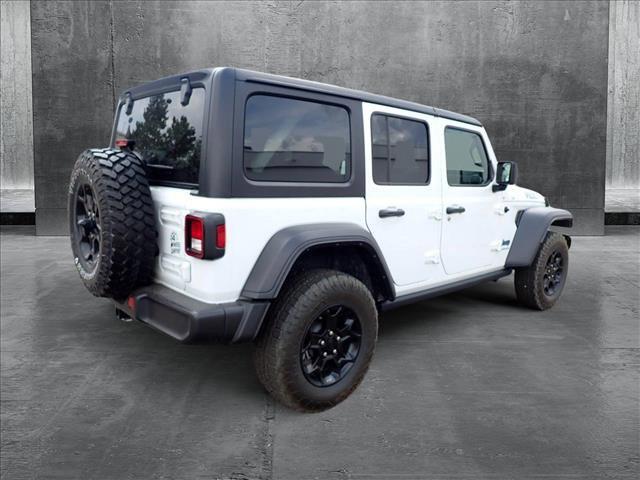 used 2023 Jeep Wrangler 4xe car, priced at $29,299