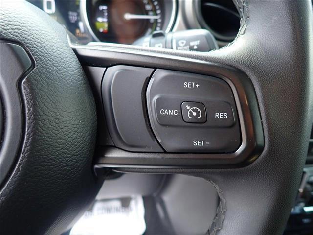 used 2023 Jeep Wrangler 4xe car, priced at $29,299